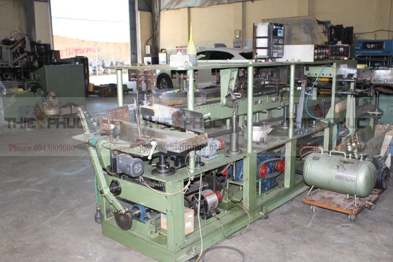 Máy cắt bụng gấp mép TP326